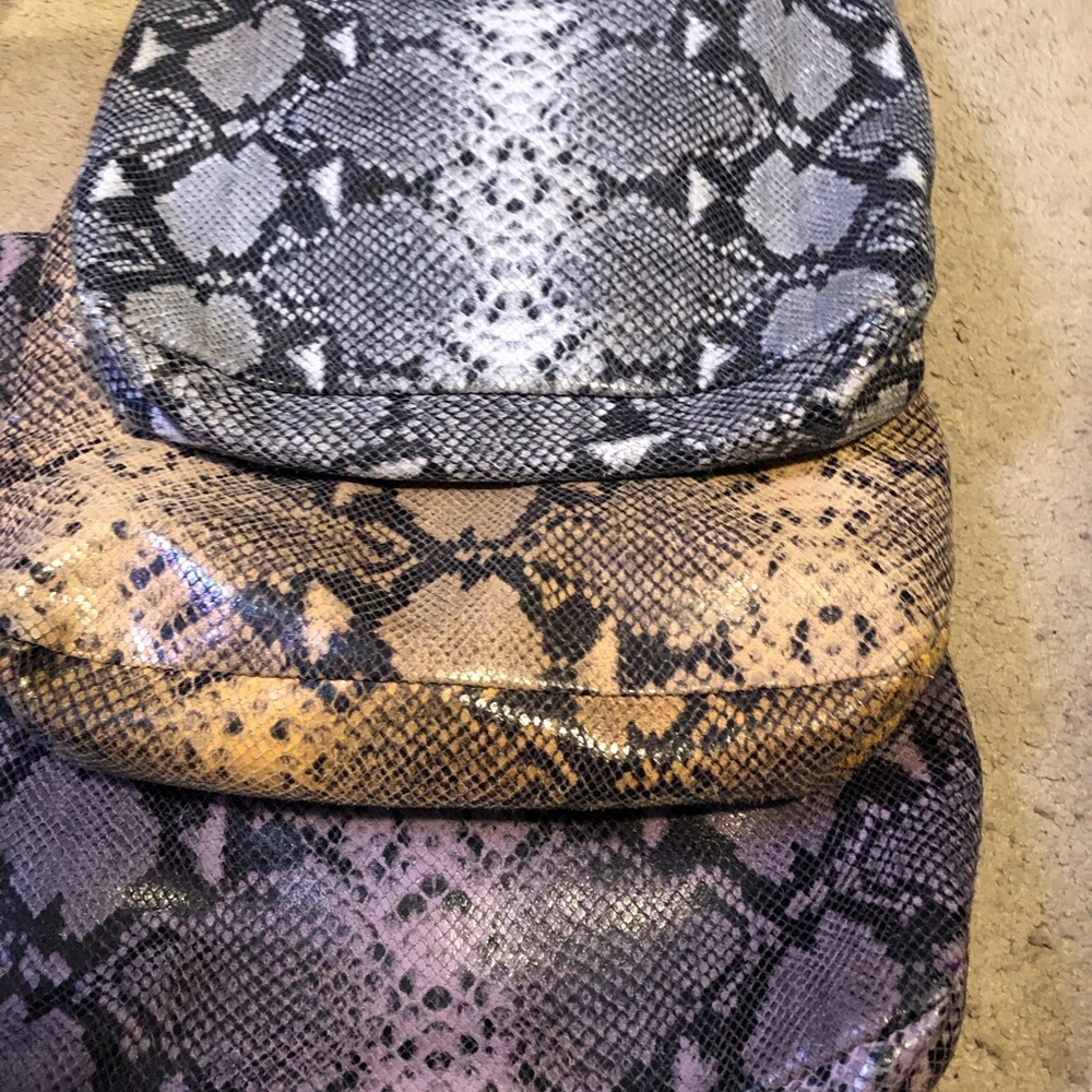 Genuine leather Cynthia Rowley totes.